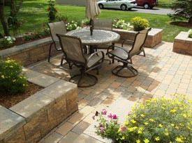 Inside stone patio with wall.