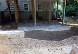 Stone back walkway to stone patio.